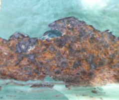 Uniform corrosion with formation of black and brown/orange corrosion products and stress mechanical cracking